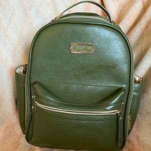 Itzy ritzy mini diaper bag - olive + muted rainbow